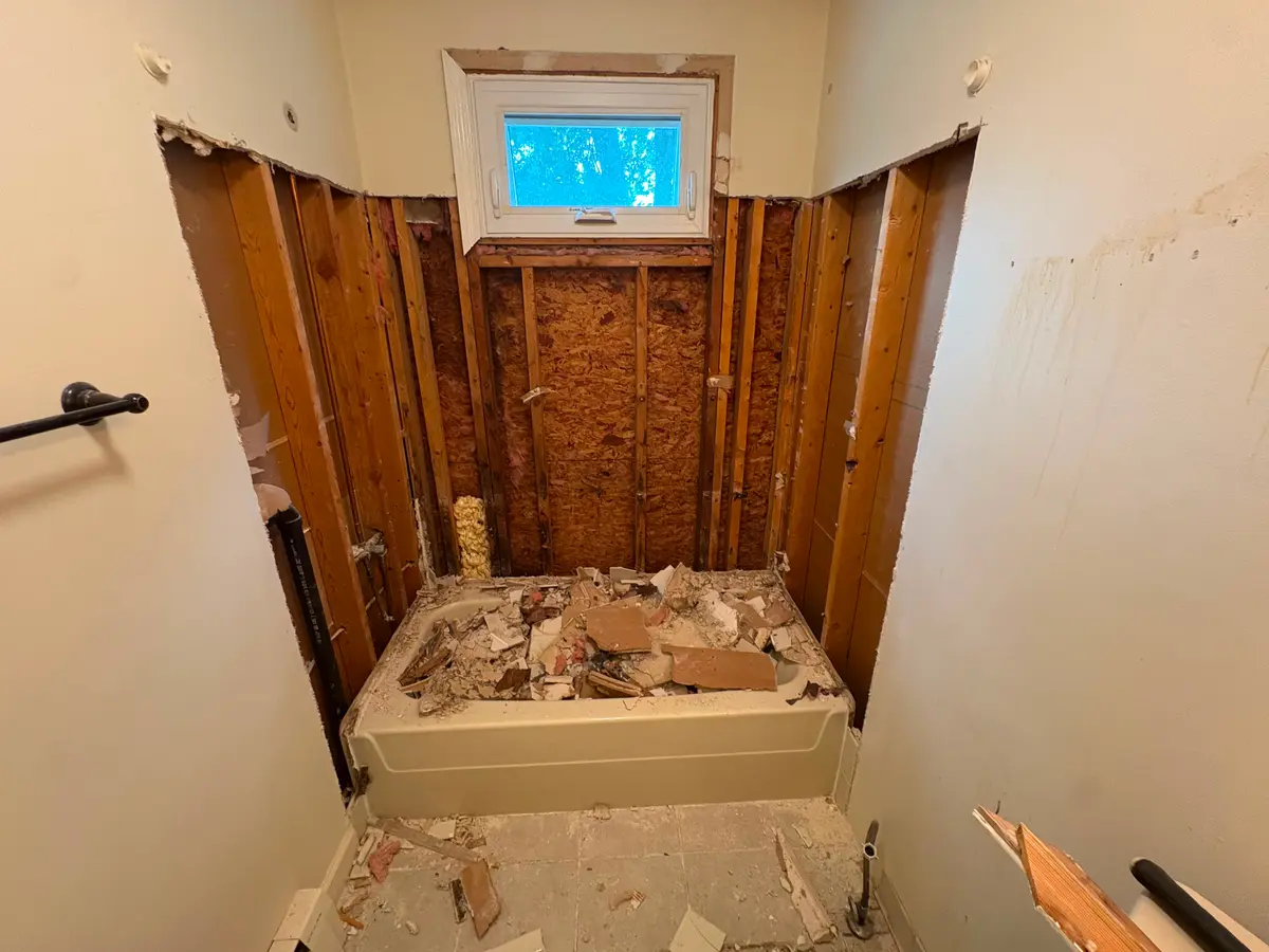 Bathroom stripped back to the studs before a C&C Multiservices remodel in Connecticut